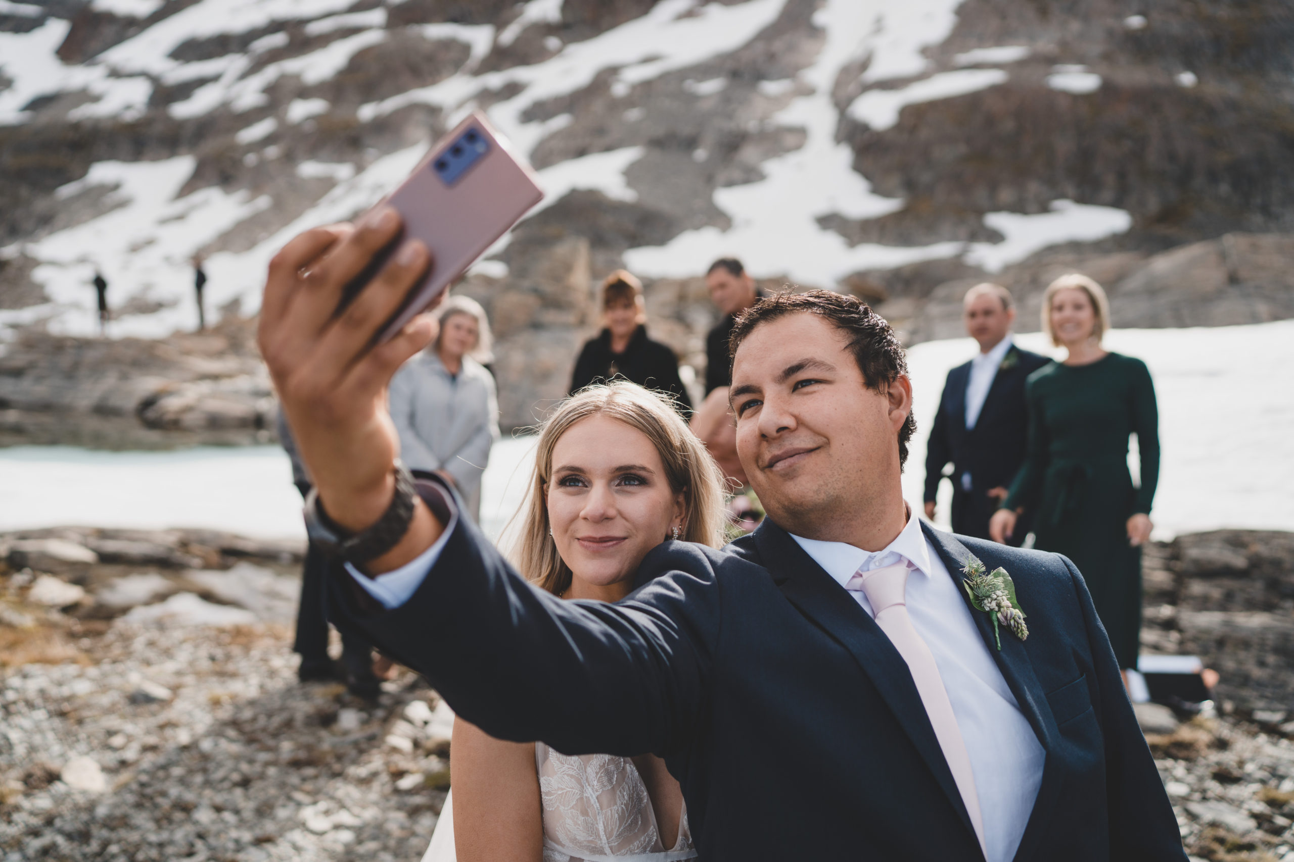 Bride and groom take selfie after wedding ceremony in Queenstown, New Zealand