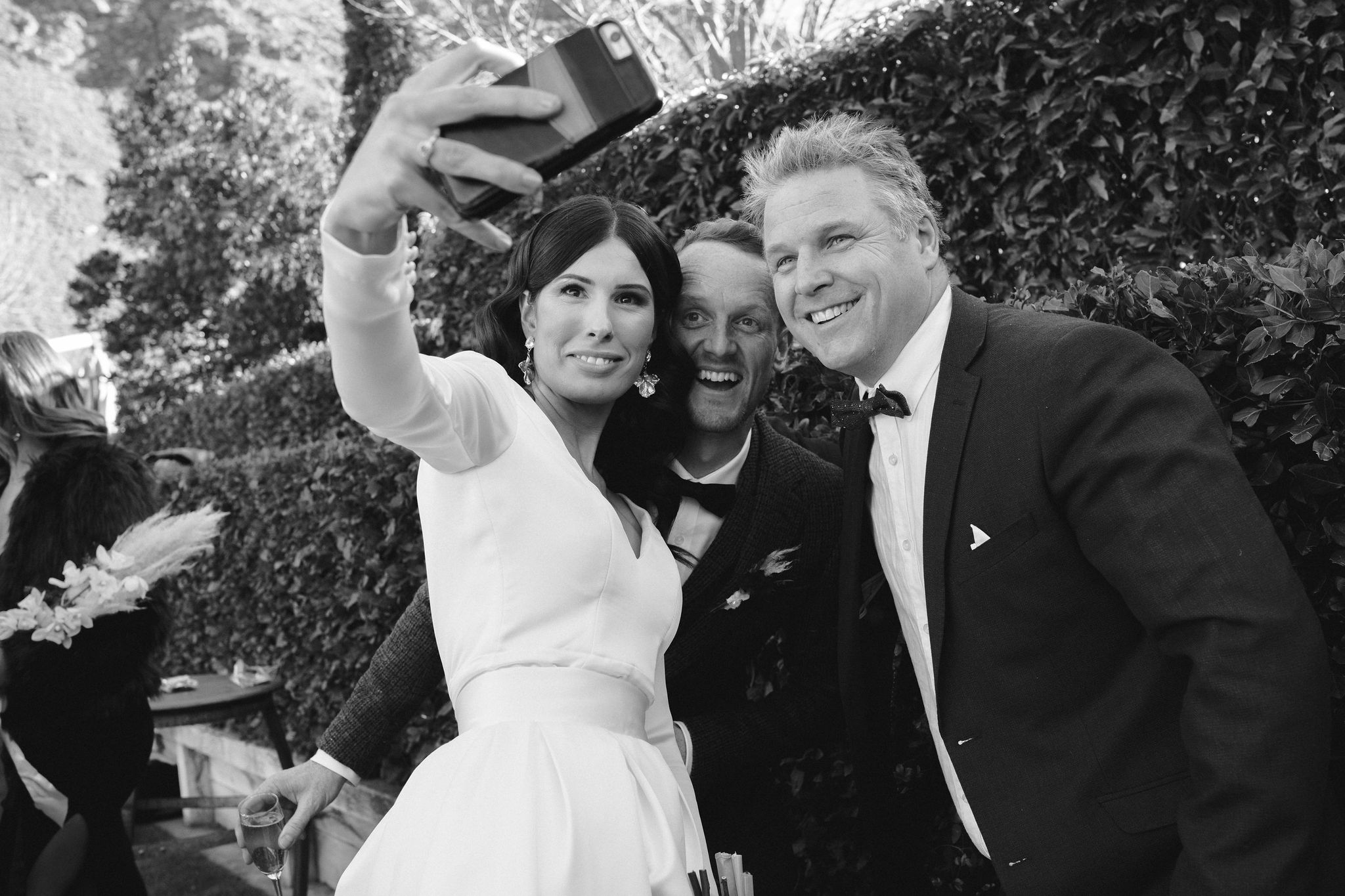 Bride and groom take selfie with celebrant at Queenstown wedding in New Zealand