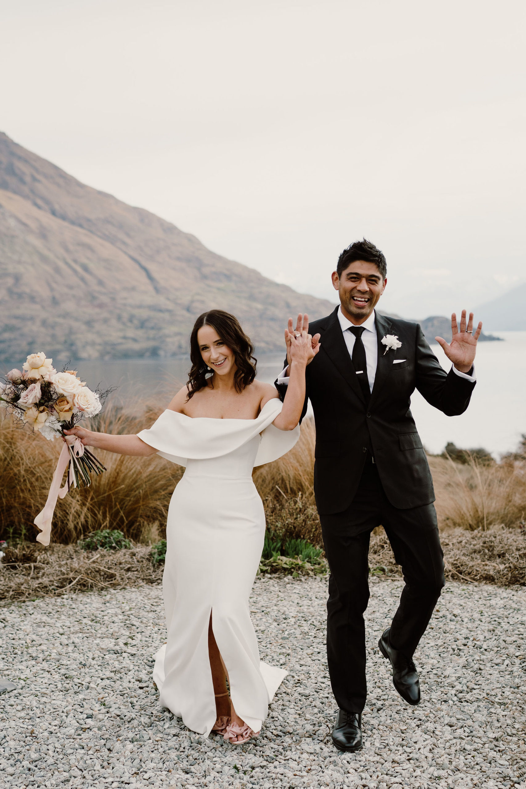 bride and groom dancing to celebrate after their wedding ceremony at Jack's Retreat in Queenstown, New Zealand