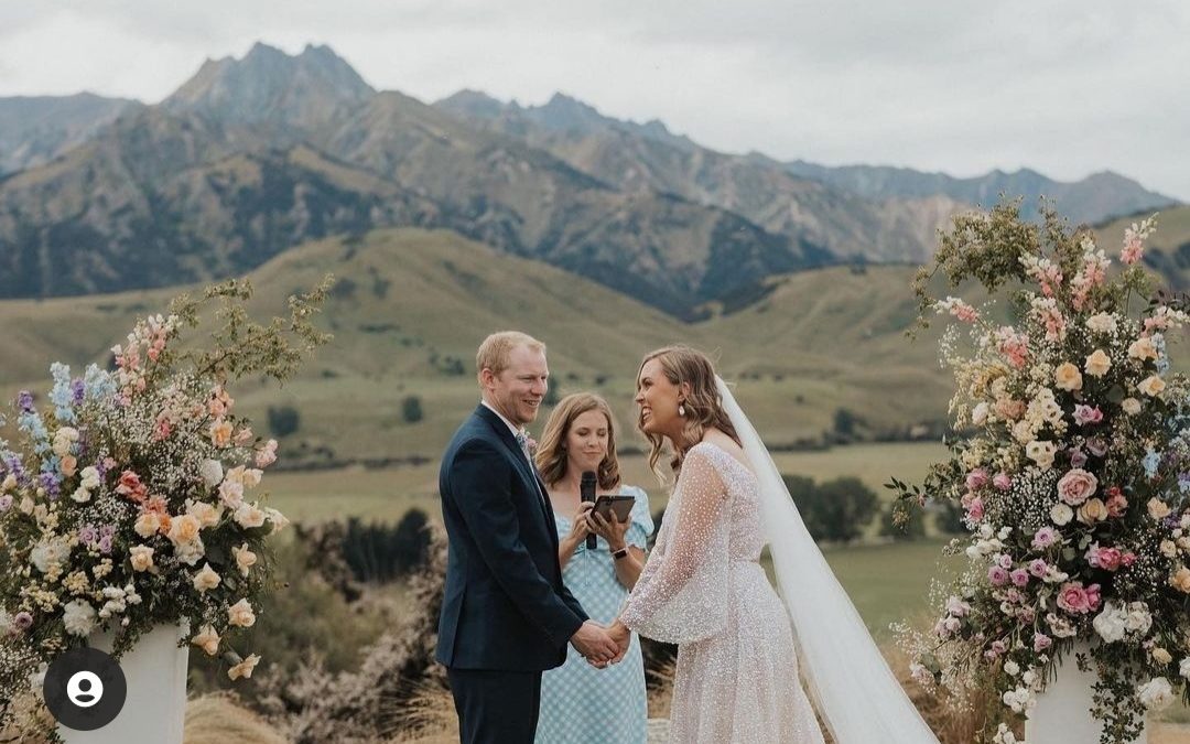 wedding ceremony with bride, groom and celebrant at Lookout Lodge in Wanaka, New Zealand