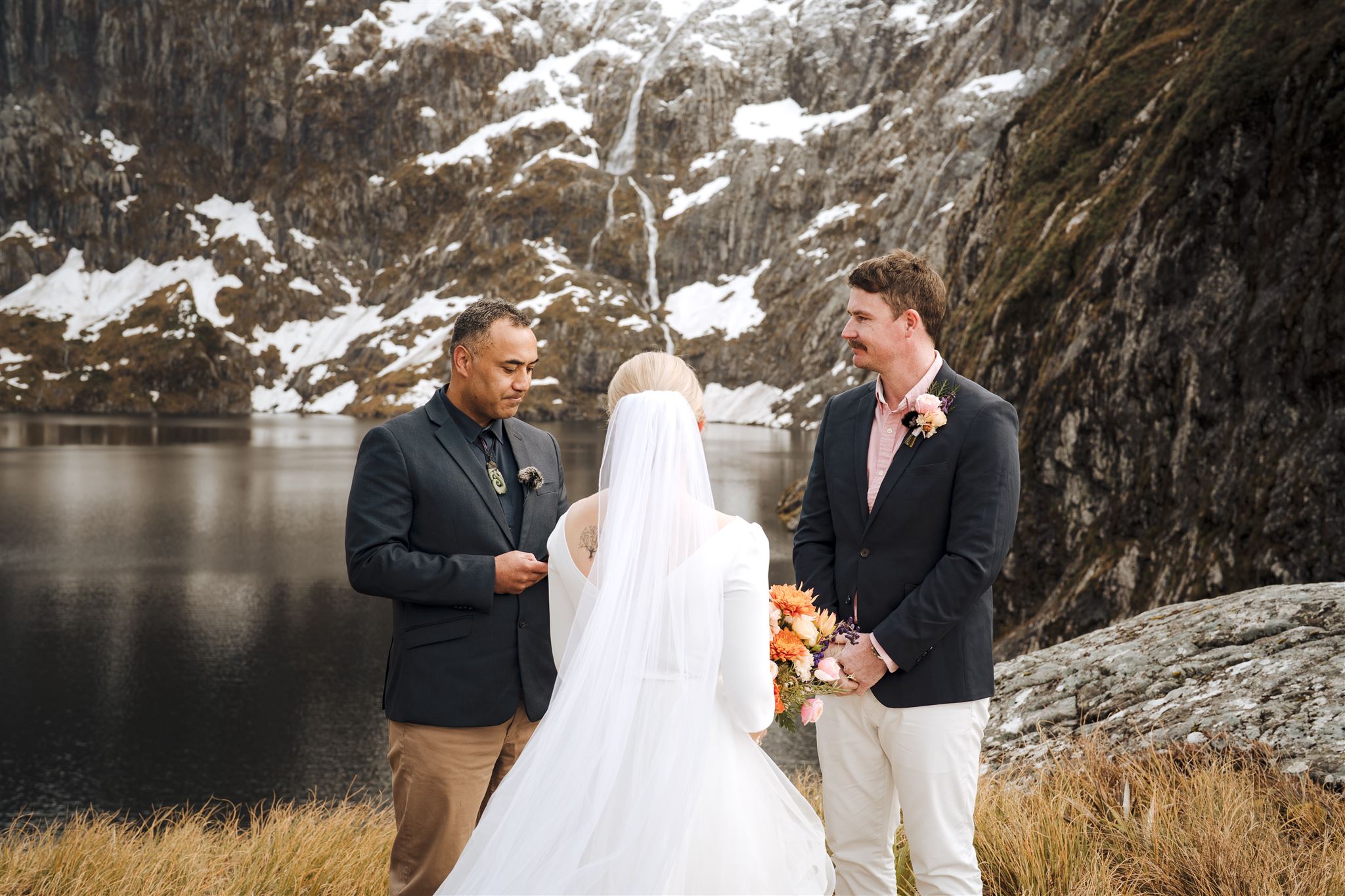 elopement ceremony with bride and groom and celebrant at Lake Quill near Queenstown, New Zealand
