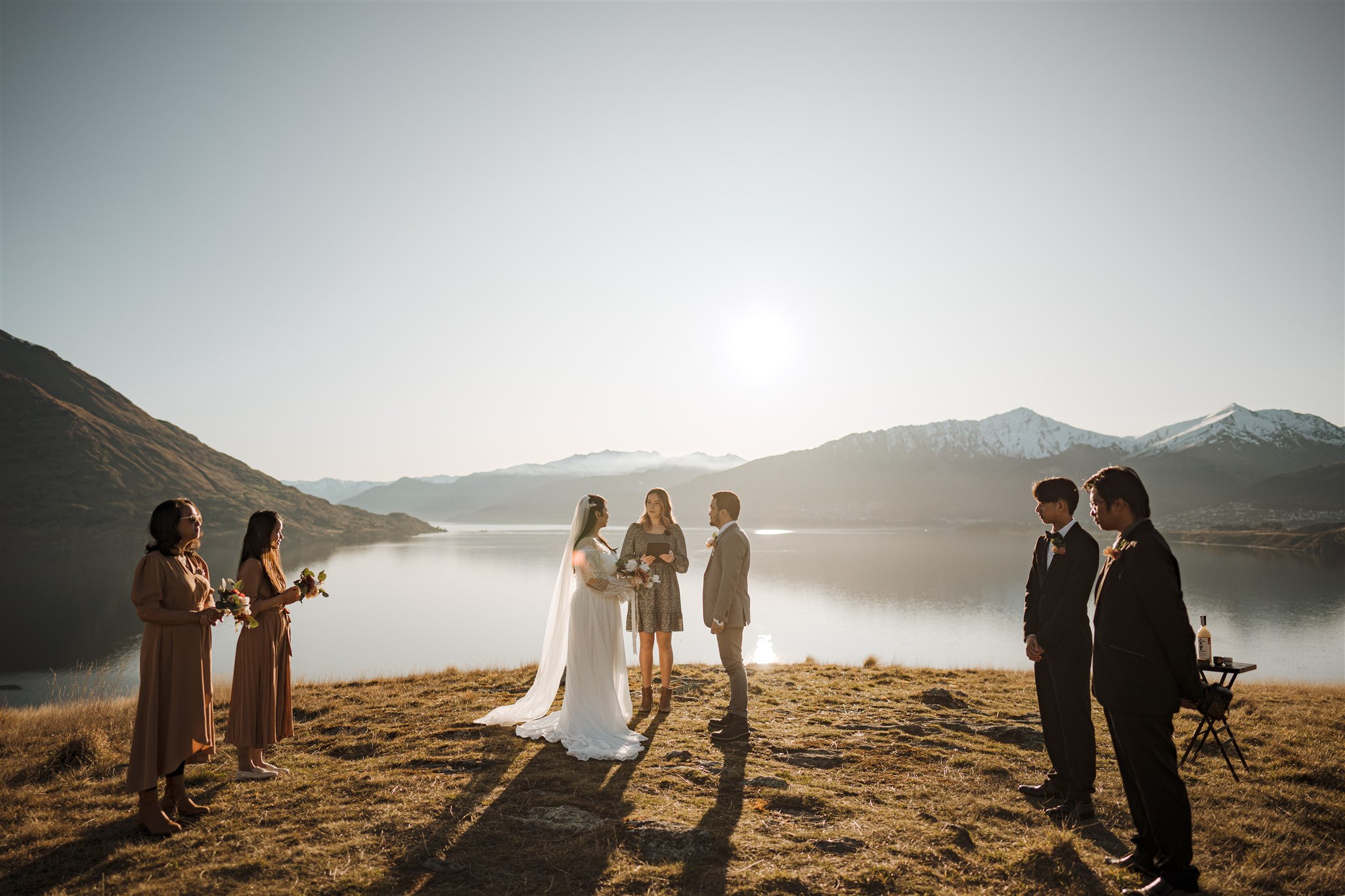 intimate wedding ceremony at sunset in Jack's Point, Queenstown, New Zealand