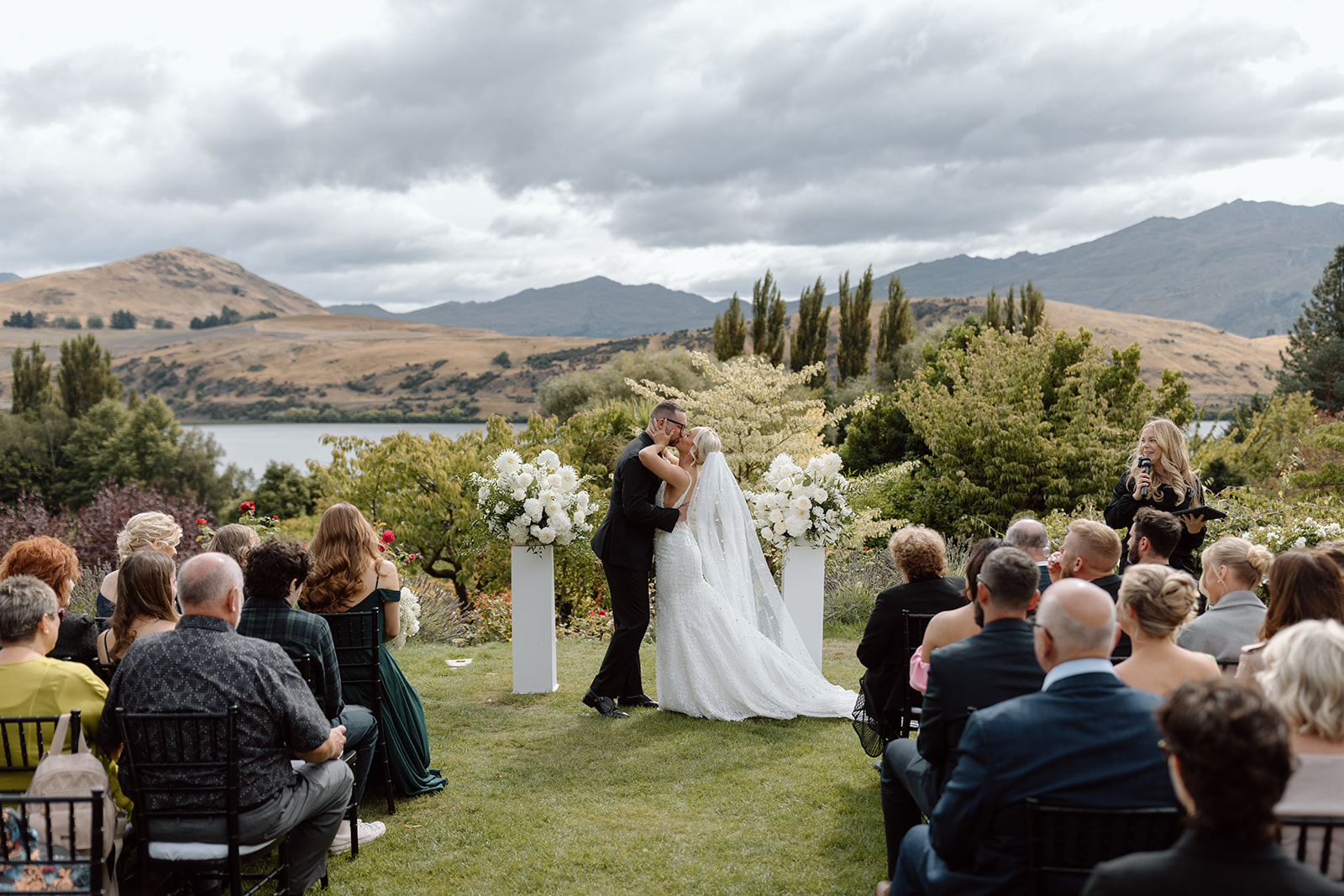 Newlywed kiss at wedding ceremony