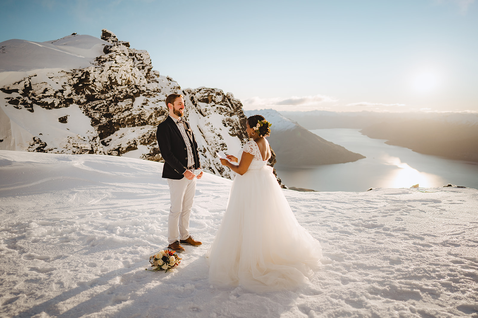 Bride read wedding vows during wedding ceremony in Queenstown snow